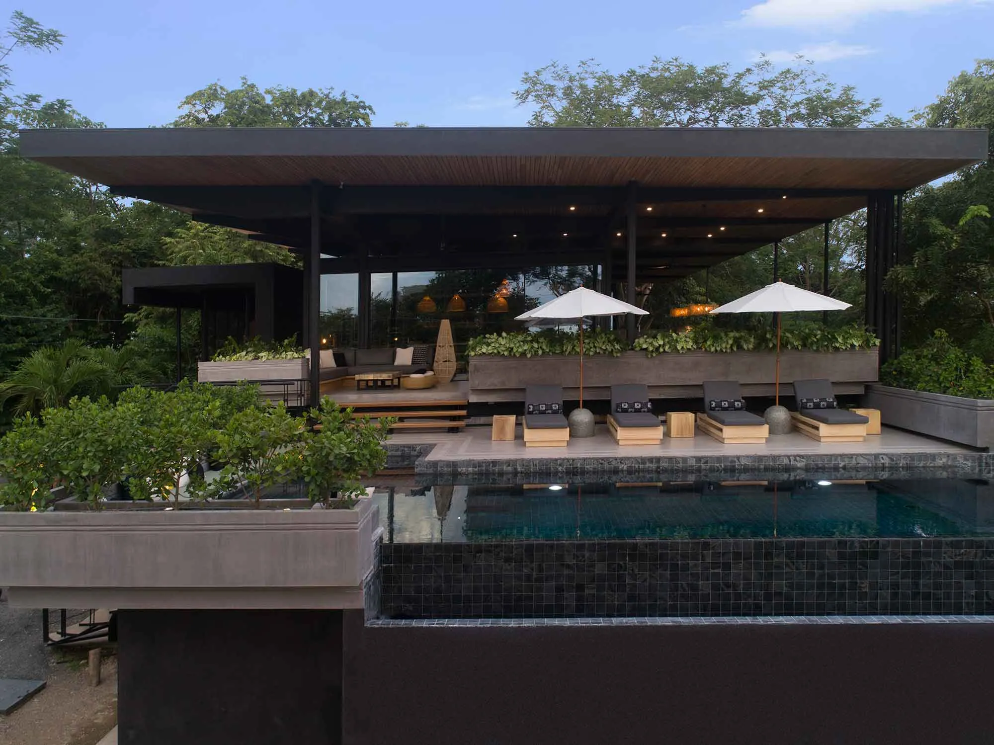 Raintree Casa twilight pool terrace, Studio Saxe architecture, Nosara