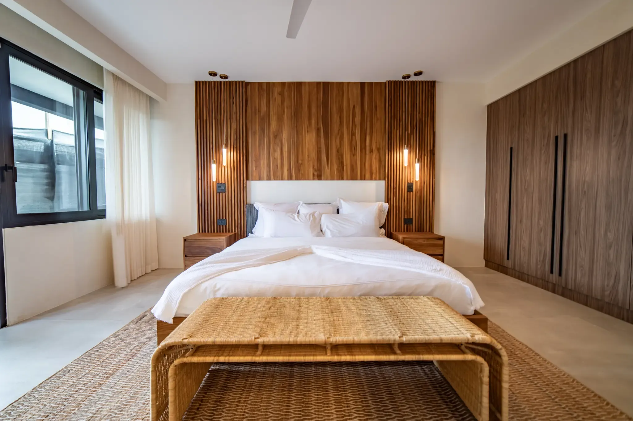 Casa Vivo villa wood-headboard bedroom, Nosara