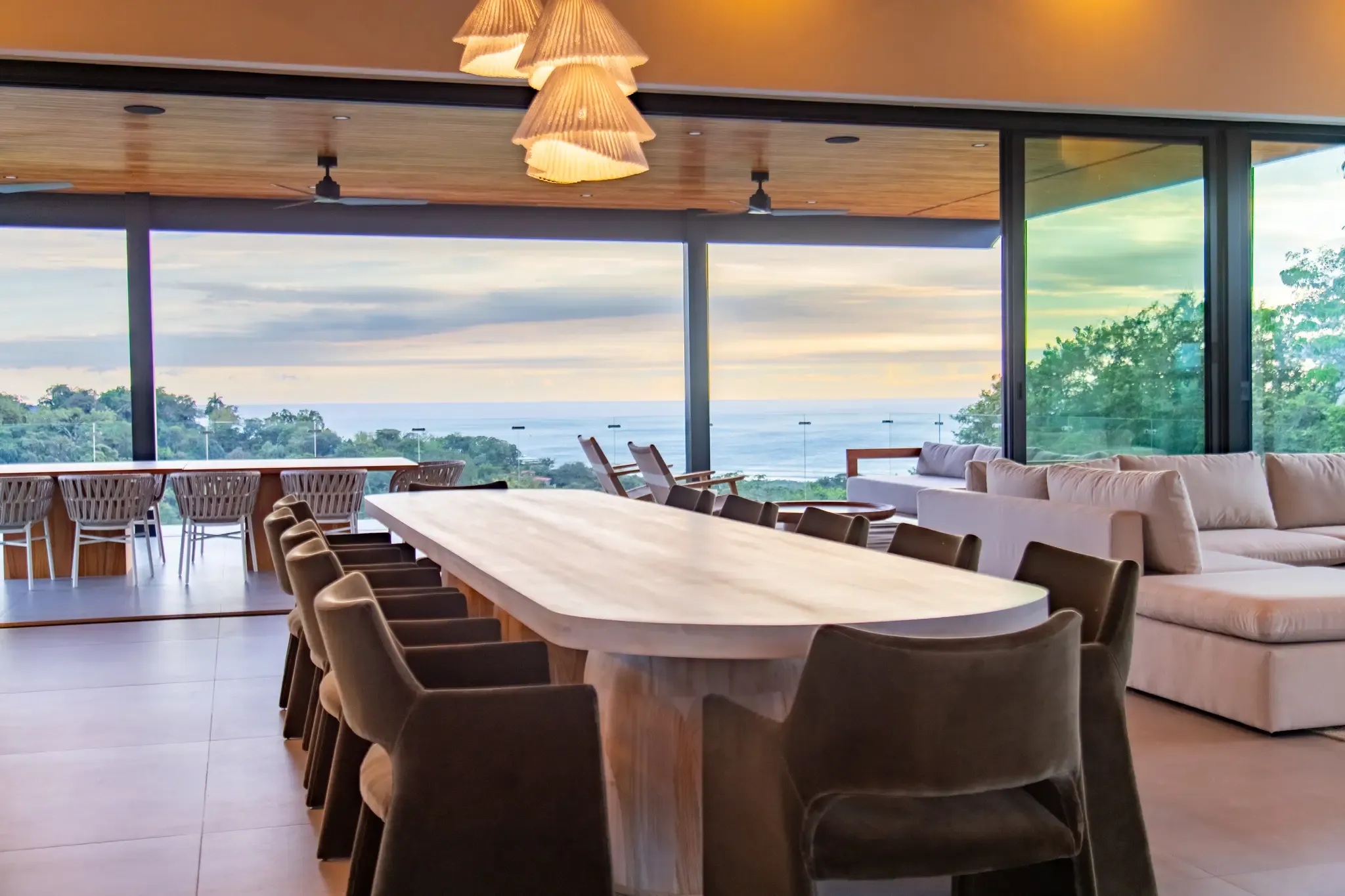 Casa Vivo villa sunset living and dining room, Nosara