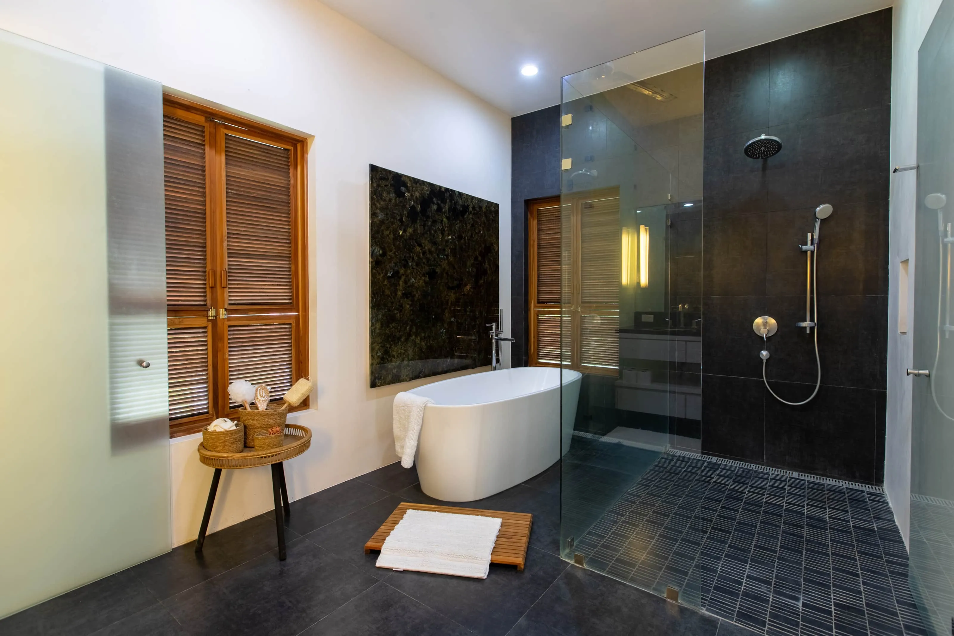 Casa Almendra villa bathroom with freestanding soaking tub and walk-in shower, Nosara