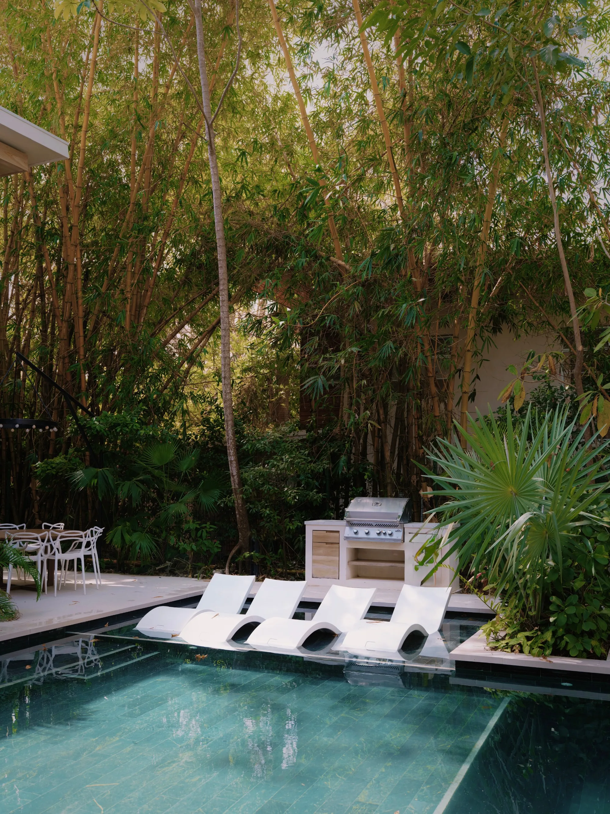Tres Hermanas villa pool with sun loungers and outdoor BBQ station, Nosara
