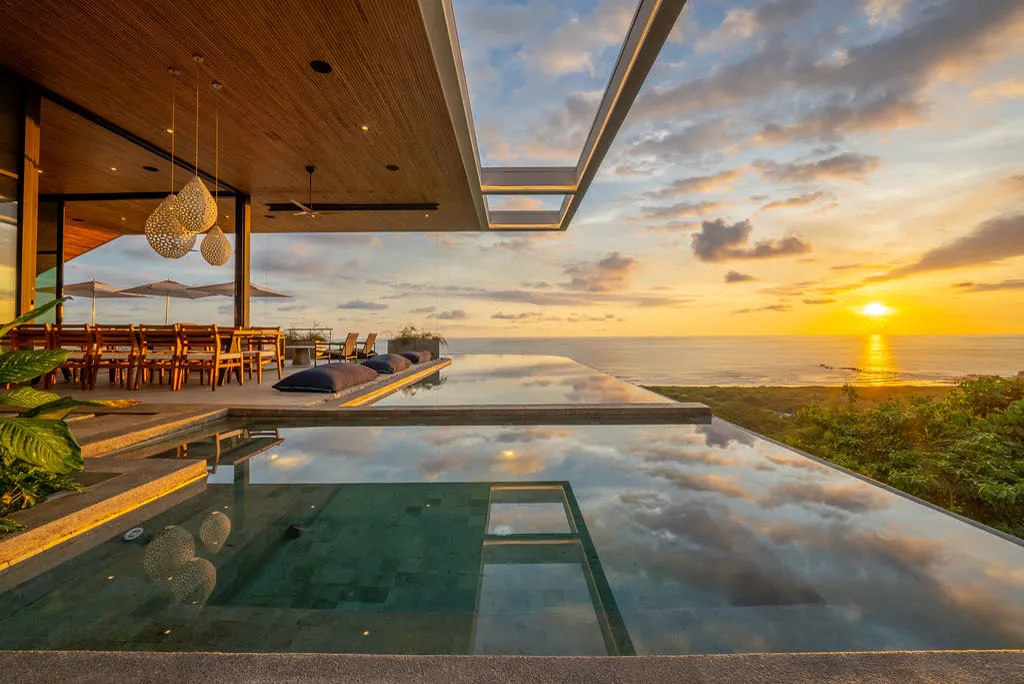 Villa Zenith infinity pool at sunset for a romantic Nosara getaway