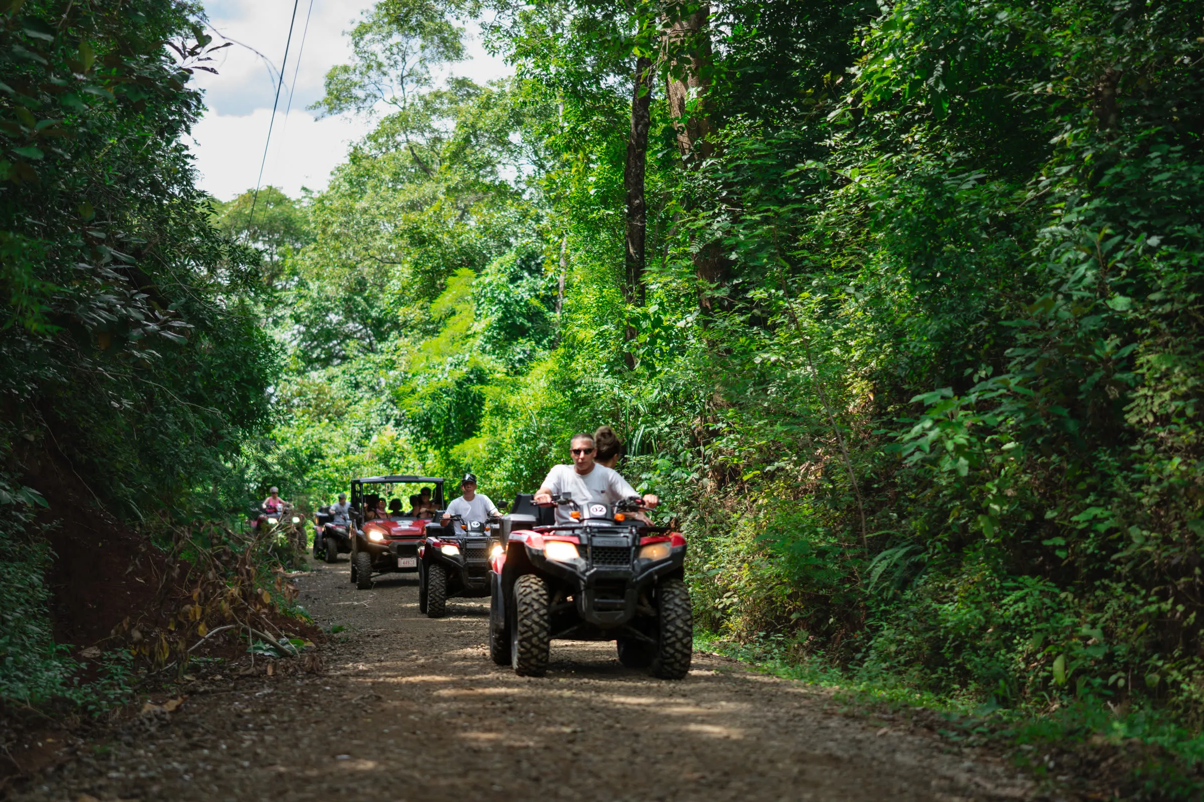 Family ATV adventure on a Nosara jungle road, Costa Rica